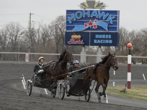 Standardbreds train at Mohawk Racetrack in April 2017.