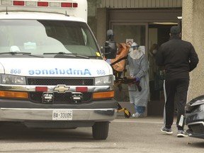 A resident is removed from the Eatonville Care Centre in Etobicoke around 3 p.m. Friday and transported via Toronto ambulance to hospital. The centre's death toll is at 39.