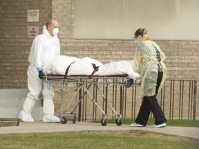 A body is removed from the Eatonville Care Centre long-term facility on The East Mall  in Etobicoke on Tuesday April 14, 2020.