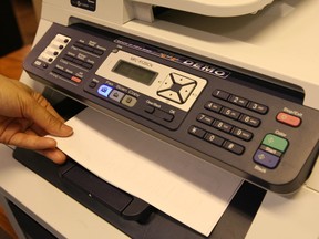Photo showing a fax machine.