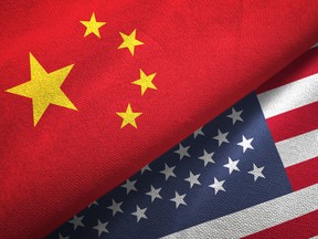 United States and China two flags together realations textile cloth fabric texture
