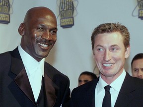 Basketball's Michael Jordan (L) and hockey's Wayne Gretzky arrive at Madison Square Garden in 1999, for the Sports Illustrated 20th Century Sports Awards.