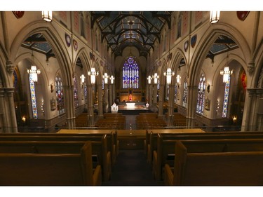 Roman Catholic Cardinal Thomas Colllins presides over Good Friday mass at St, Michael's Cathedral Basilica on Bond St. To and empty church on Good Friday on Friday April 10, 2020. Jack Boland/Toronto Sun/Postmedia Network