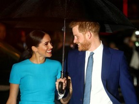 Britain's Prince Harry and his wife Meghan, Duchess of Sussex, arrive at the Endeavour Fund Awards in London, on March 5, 2020.