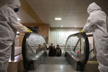 Workers disinfect an escalator in Serdika metro station, following the outbreak of the coronavirus disease (COVID-19), Sofia, Bulgaria, April 8, 2020.  REUTERS/Stoyan Nenov ORG XMIT: PPP-STN104