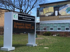 A sign outside the Etobicoke School of Arts, which is closed along with all other schools in Ontario due to the COVID-19 crisis, on April 22, 2020. A date for the return of students to school is still unclear.