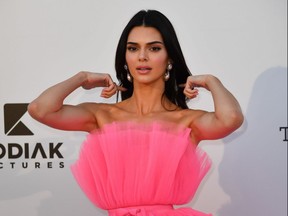 Kendall Jenner poses as she arrives on May 23, 2019 at the amfAR 26th Annual Cinema Against AIDS gala at the Hotel du Cap-Eden-Roc in Cap d'Antibes, France, on the sidelines of the 72nd Cannes Film Festival.