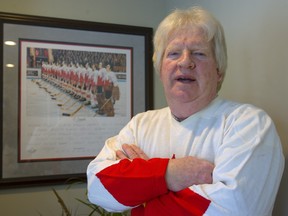 Pat Stapleton stans next to a photo of Team Canada at the 1972 Summit Series in 2010.. Mike Hensen/Postmedia files