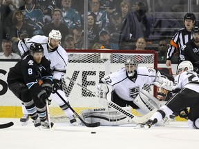 Kings goalie Jonathan Quick keeps his eyes on the action during Game 7 of Los Angeles' first-round playoff series against the San Jose Sharks on April 30, 2014. Quick, hammered for 16 goals in three consecutive losses, gave up just five goals in the next four games as the Kings rallied to win the series.