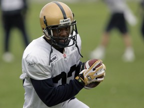 Fred Reid, a new coach for the Toronto Argonauts, put together back-to-back 1,000-yard rushing seasons with the Winnipeg Blue Bombers during his playing days. (Postmedia File Photo)