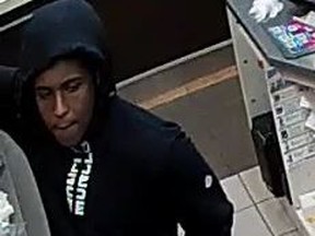An image released by York Regional Police of a man wanted in a series of robberies in Markham.