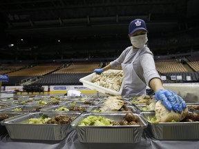 Maple Leafs Sports and Entertainment culinary staff and Second Harvest have combined to create 10,000 meals a day to support front-line hospital workers and shelters the Scotiabank arena. Inside the Scotiabank arena staff cook, prep and package all the foods for their destinations.