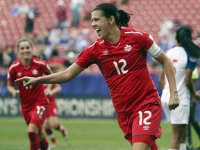 Canada forward Christine Sinclair celebrates after scoring a goal in the second half of a soccer match at the CONCACAF women's World Cup qualifying tournament against Panama.