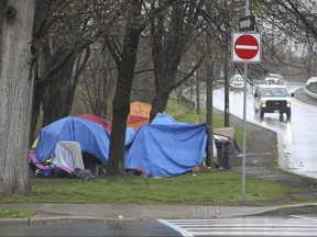 Large tent cities such as this one at the Richmond St. E. ramp have sprung up around the city with the homeless taking to parks and green areas on Thursday April 30, 2020.
