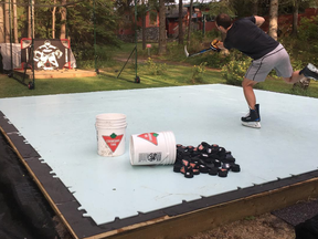 Jonathan Toews of the Blackhawks gets off some shots from his synthetic ice setup in his backyard.