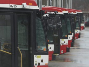 Bus lie in wait to go into service at the Comstock TTC yards on Monday March 23, 2020. Jack Boland/Toronto Sun/Postmedia Network