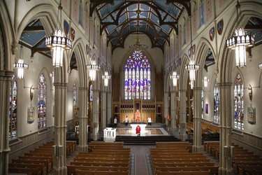 Roman Catholic Cardinal Thomas Colllins presides over Good Friday mass at St. Michael's Cathedral Basilica on Bond St. To and empty church on Good Friday on Friday April 10, 2020. Jack Boland/Toronto Sun/Postmedia Network