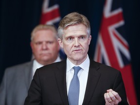 Ontario premier Doug Ford  (left) and Rod Phillips, Minister of Finance 
in March. Mathew Lau argues while a large deficit is difficult to avoid during the current economic crisis, the resulting increase in debt makes it even more important for the provincial government to take decisive action to get the budget under control when the crisis has passed. Ontario is currently the most indebted sub-sovereign borrower in the world.