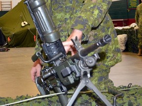 This file photo shows a belt-fed machine gun pictured at the Tommy Holmes, VC, Memorial Armoury in Owen Sound, Ont.