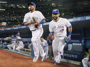 Edwin Encarnacion (left) and Jose Bautista both spoke glowingly of retired Toronto Sun baseball columnist Bob Elliott, author of a new book  on the Blue Jays that takes readers behind the scenes in a way that no one else would be qualified to do.