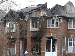 Two children and one adult were rushed to hospital after a fire ravaged a townhome on Bur Oak Ave. in Markham on May 17, 2020.