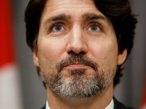 Prime Minister Justin Trudeau pauses during a news conference on Parliament Hill on May 1, 2020.