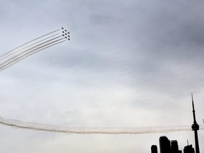 The Snowbirds flew over Toronto on Sunday as part of a Canada-wide tour to honour those fighting COVID-19.