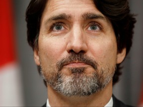 Prime Minister Justin Trudeau pauses during a news conference on Parliament Hill in Ottawa, May 1, 2020.
