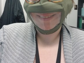 Intervenor Yvonne Walker wears a special clear mask a the Canadian Helen Keller Centre.