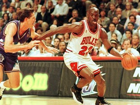 Chicago Bulls' Michael Jordan drives to the basket during the 1997 NBA Finals.