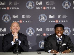 Bill Manning, left, president of the Toronto Argonauts and Mike (Pinball) Clemons speak as Clemons is announced as the new general manager of the Toronto Argonauts during a press conference at BMO Field in Toronto, Tuesday, Oct. 8, 2019.