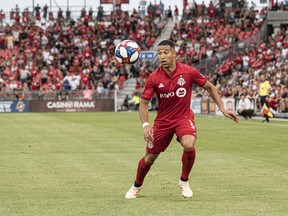 Toronto FC defender Justin Morrow (2) controls a pass during first half MLS action against the Houston Dynamo, in Toronto on Saturday, July 20, 2019. Amidst talk that the MLS may look to return to action with all teams playing in the Orlando area, veteran fullback Justin Morrow and other Toronto FC players are back training - albeit by themselves and under strict COVID-19 protocol.