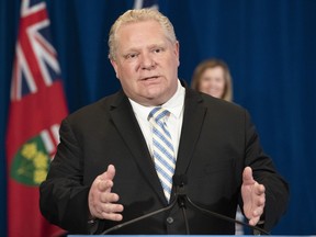 Ontario Premier Doug Ford answers questions at the daily briefing at Queen's Park in Toronto on Friday, May 15, 2020.