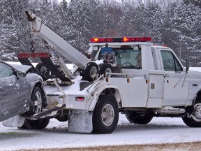 tow truck towing car