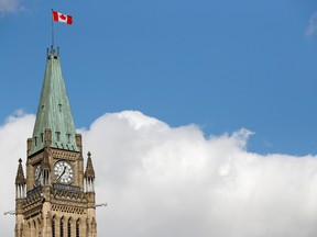 The Canadian flag on the Peace Tower flies in Ottawa, Ontario. 
Ontario is reporting 421 new COVID-19 cases Friday, and 39 more deaths, while the growth rate of cases moved slightly lower.

The province has now seen 16,608 cases, an increase of 2.6 per cent over the previous day. That's down from the 2.9 per cent growth rate on Thursday, as the province looks for a consistent two-to-four weeks of declines before starting to reopen the economy.