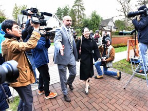 In this file photo taken on January 21, 2020 Huawei chief financial officer Meng Wanzhou leaves her Vancouver home with her security detail for an extradition hearing in British Columbia Supreme Court, in Vancouver. (DON MACKINNON/AFP)