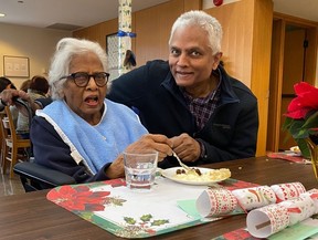 Anil Reddi with his 93-year-old mom Vimal Kotak, who is a resident at True Davidson Acres long-term care facility. SUPPLIED/FAMILY