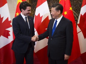 Prime Minister Justin Trudeau meets Chinese President Xi Jinping at the Diaoyutai State Guesthouse in Beijing, China on Tuesday, Dec. 5, 2017.