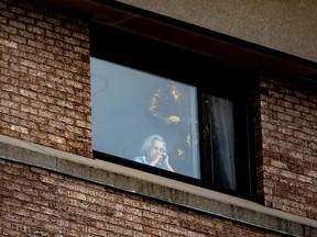 Ninety five-year-old Alicia Tamayo talks on the phone with her daughter, Betty Fernandez, and granddaughter, Romina Varella at Eatonville Care Centre on April 14, 2020.