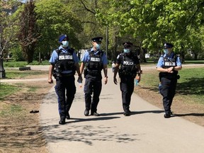 Police and bylaw officers were out in force at Bellwoods Trinity Park on Sunday.