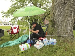 Innis Ingram is holding a hunger strike and has chained himself to a large tree outside of Camilla Care Community long-term care home in Mississauga.