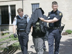 A 14-year-old boy, who is currently serving life in prison for killing his mother, Michelle Barnoski, 33, in Warkworth, is seen here after appearing in Cobourg court in 2008.
