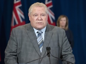 Ontario Premier Doug Ford answers questions during a daily news briefing at Queen's Park in Toronto on Wednesday, April 29, 2020.