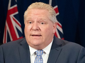 Ontario Premier Doug Ford answers questions at the daily briefing at Queen's Park in Toronto on Friday, May 1, 2020.