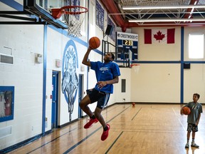 Canadian basketball prospect Elijah Fisher goes up for a layup at practice at Crestwood Preparatory College in Toronto.
