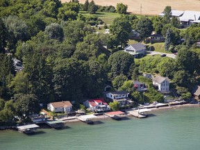 Cottages are seen along the Lake Erie shoreline near Turkey Point, Ont., on July 15, 2019.