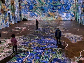 A new Vincent van Gogh exhibit provides an immersive experience while using marked circles to allow guests to physical distance.