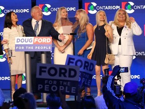 Ontario's Premier Doug Ford with his family on stage after addressing his supporters at the Toronto Congress Centre.