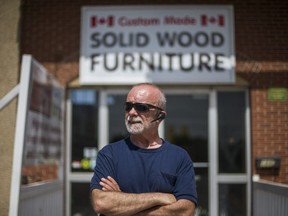 Paul Drysdale, owner of GTA Furniture Central Inc. standings outside his storefront on Friday, May 22, 2020. He has been evicted from his store in Brampton, Ont.