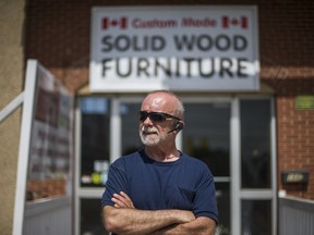Paul Drysdale, owner of GTA Furniture Central Inc. standings outside his storefront on Friday, May 22, 2020. He has been evicted from his store in Brampton, Ont.